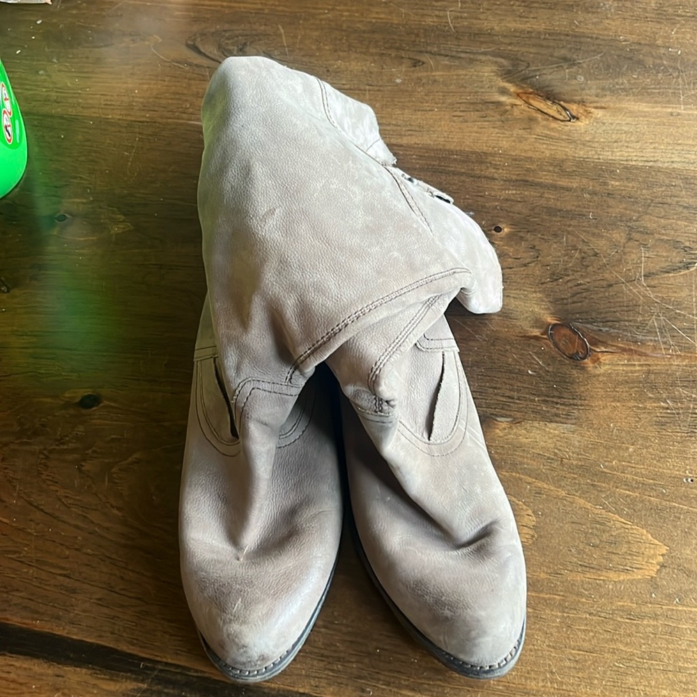 Gray boots.  Very worn.